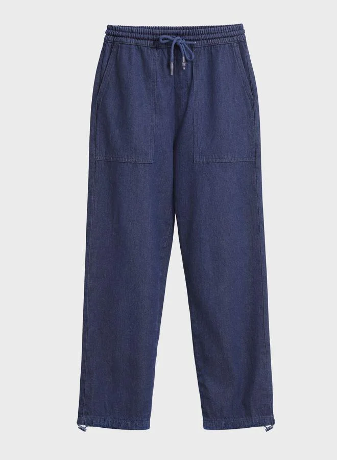 The Indian Garage Co  Men Relaxed Fit Solid Patch Pocket Mid-Rise Jeans for Men | Best Price UAE
